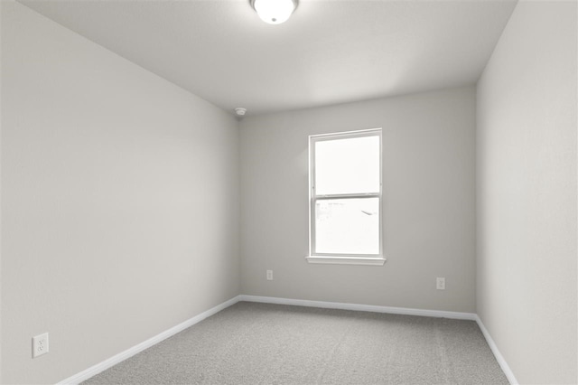 unfurnished room featuring carpet floors