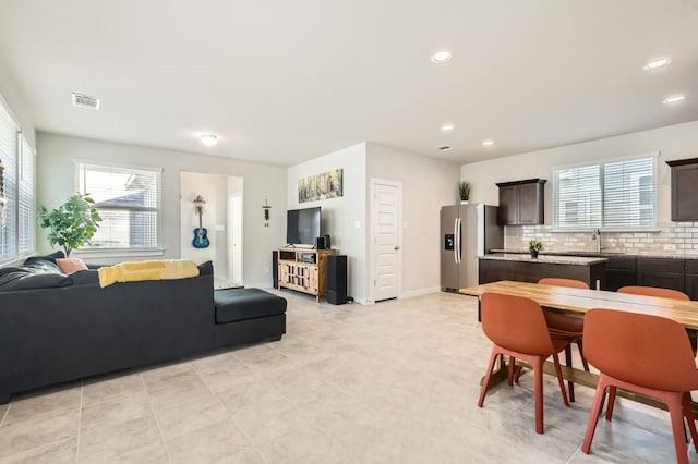 living room featuring sink