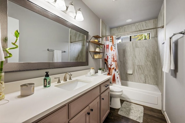 full bathroom featuring shower / bath combo, vanity, hardwood / wood-style flooring, and toilet