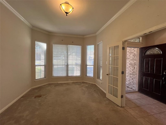 carpeted entryway featuring ornamental molding