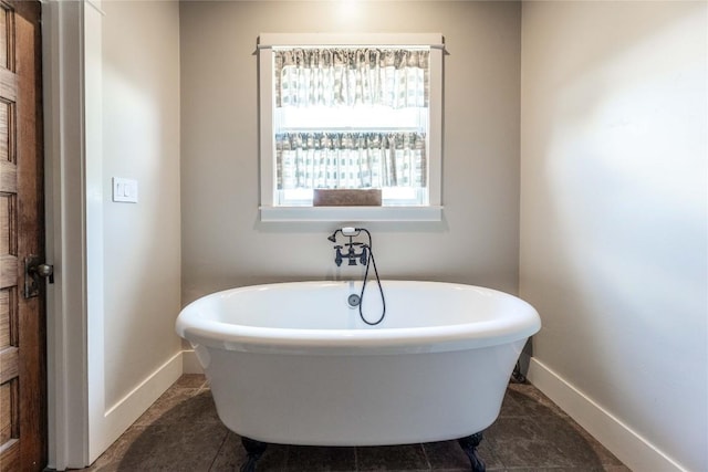 bathroom with a tub