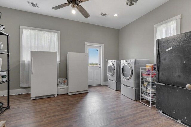1440 W Klein Rd, New Braunfels, TX 78130 - laundry room featuring washing machine and clothes dryer, plenty of natural light, a ceiling fan, wood finished floors, and recessed lighting