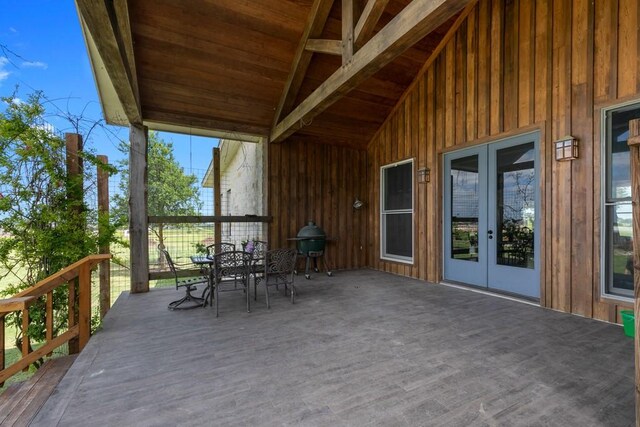 view of patio with a grill, a deck, and french doors