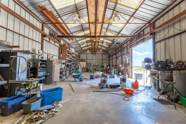 1440 W Klein Rd, New Braunfels, TX 78130 - garage featuring metal wall and a workshop area