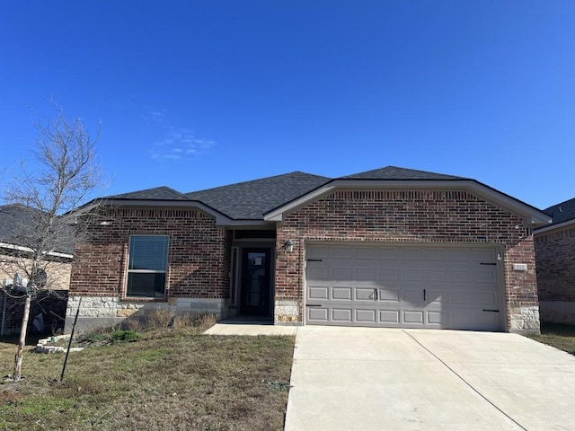 single story home with a garage