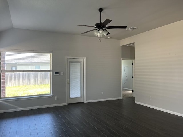 spare room with ceiling fan, dark hardwood / wood-style flooring, and lofted ceiling