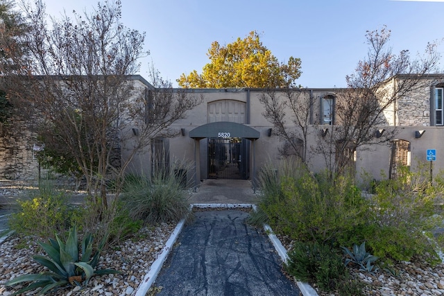 5820 Berkman Dr Unit 116, Austin, TX 78723 - view of front of house with stucco siding