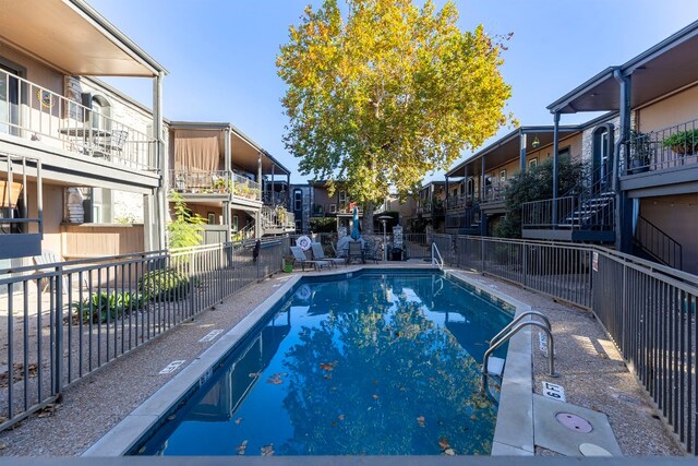 5820 Berkman Dr Unit 116, Austin, TX 78723 - community pool with a residential view