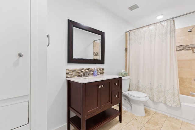 full bathroom featuring shower / bath combination with curtain, backsplash, tile patterned floors, vanity, and toilet