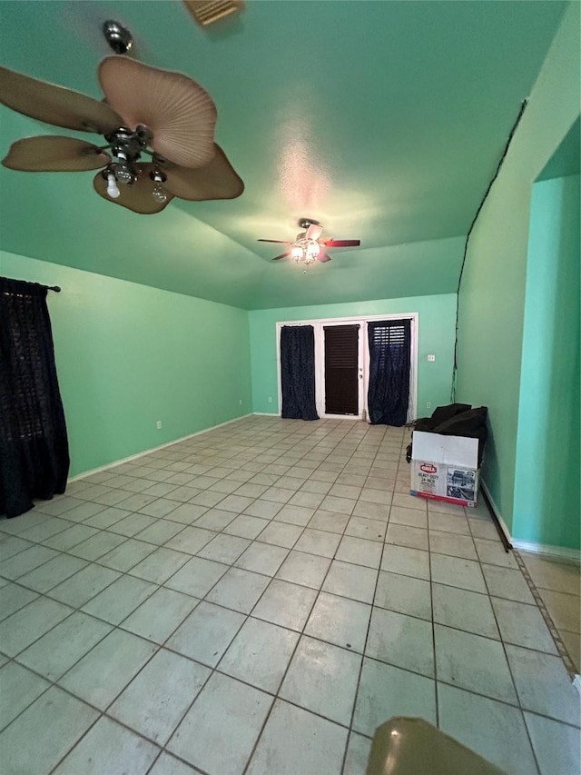 unfurnished living room with light tile patterned flooring