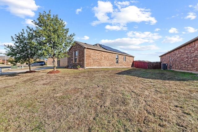 view of yard with central AC