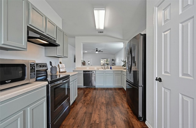 kitchen featuring gray cabinetry, ceiling fan, vaulted ceiling, and appliances with stainless steel finishes