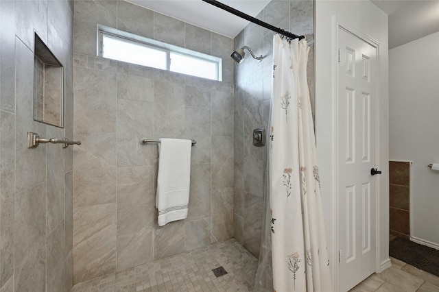 bathroom featuring walk in shower