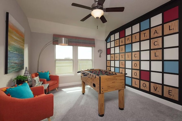 rec room featuring ceiling fan and light colored carpet