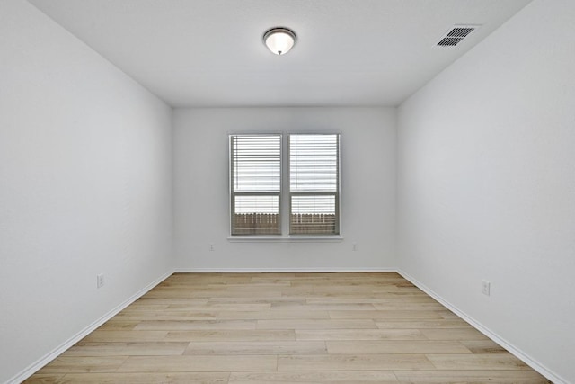 8004 Tranquil Glade Trl, Austin, TX 78744 - unfurnished room featuring light wood-style flooring and baseboards
