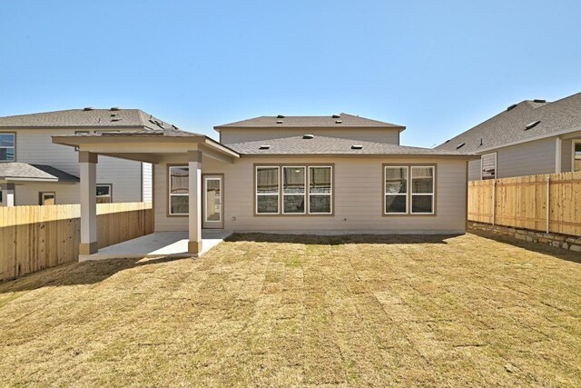 8004 Tranquil Glade Trl, Austin, TX 78744 - back of house featuring a patio area and a fenced backyard