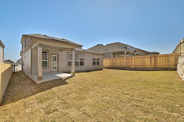 8004 Tranquil Glade Trl, Austin, TX 78744 - back of property with a patio area
