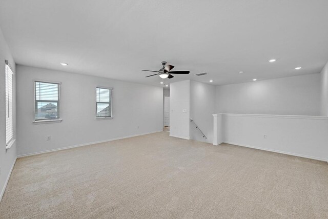 8004 Tranquil Glade Trl, Austin, TX 78744 - unfurnished room featuring recessed lighting, light carpet, and ceiling fan