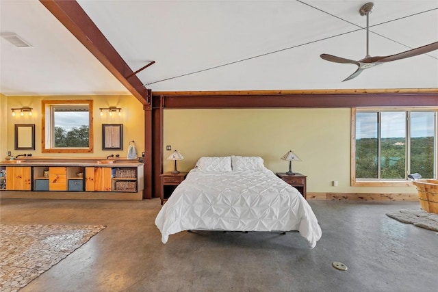 176 Elk Rdg, Canyon Lake, TX 78133 - bedroom with concrete floors, lofted ceiling, and ceiling fan