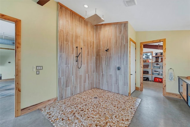 176 Elk Rdg, Canyon Lake, TX 78133 - full bath featuring concrete flooring, tiled shower, and visible vents