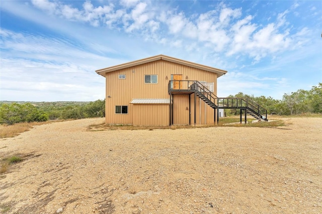 176 Elk Rdg, Canyon Lake, TX 78133 - exterior space featuring a wooden deck and stairs