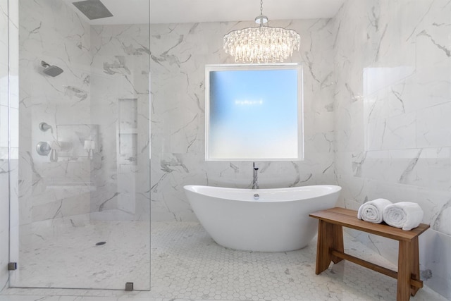 bathroom with a chandelier and plus walk in shower