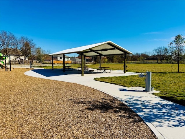 view of property's community featuring a gazebo and a lawn