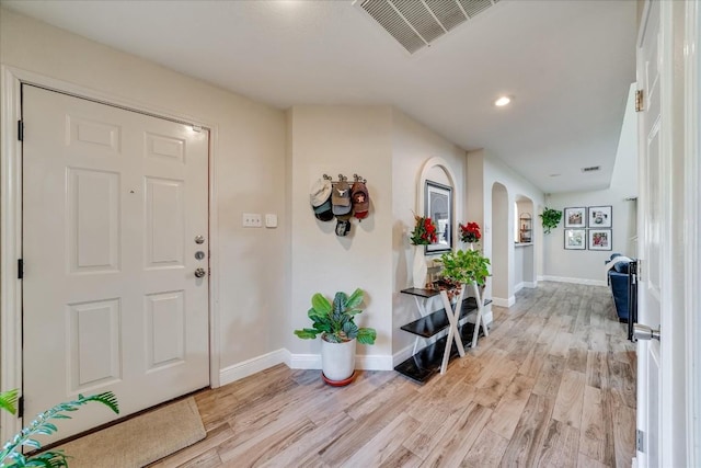 foyer entrance featuring light hardwood / wood-style floors