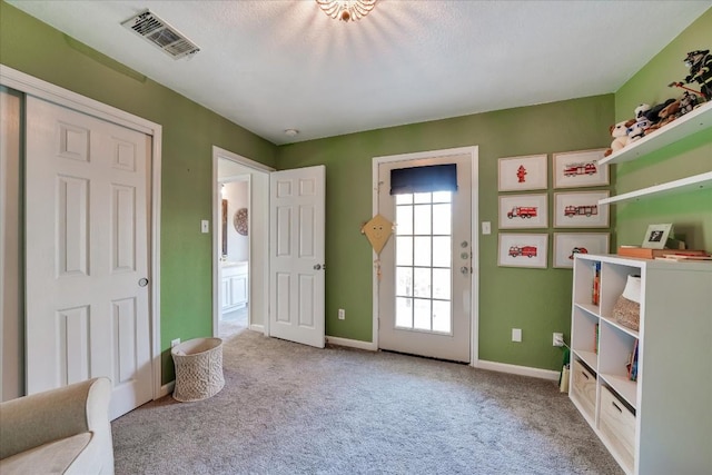 interior space with light colored carpet