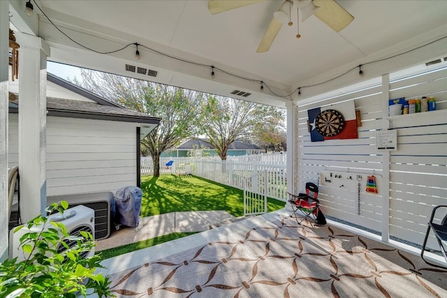 view of patio / terrace featuring ceiling fan