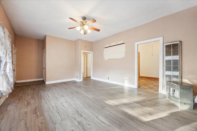 interior space with light hardwood / wood-style floors and ceiling fan