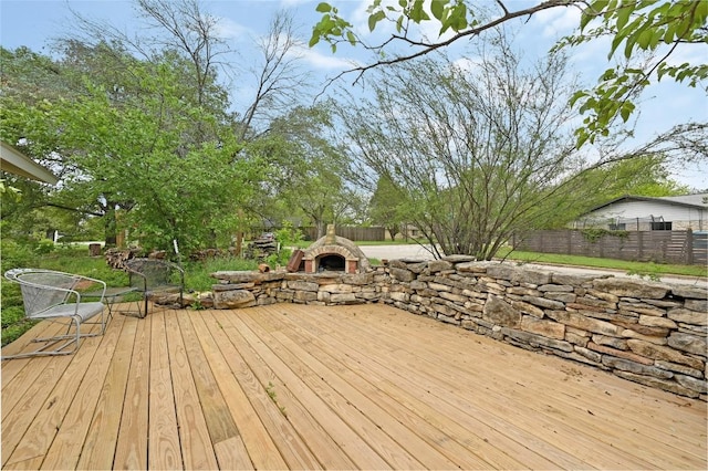 4505 Dudley Dr, Austin, TX 78735 - deck featuring an outdoor stone fireplace