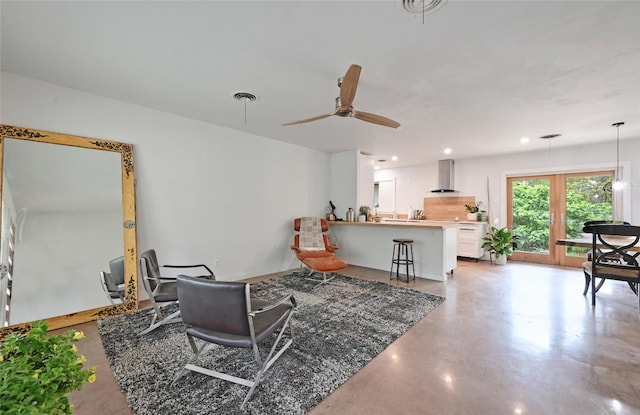 4505 Dudley Dr, Austin, TX 78735 - living area featuring concrete flooring, a ceiling fan, and recessed lighting
