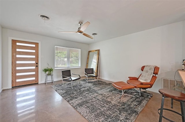 4505 Dudley Dr, Austin, TX 78735 - living area featuring finished concrete flooring and ceiling fan