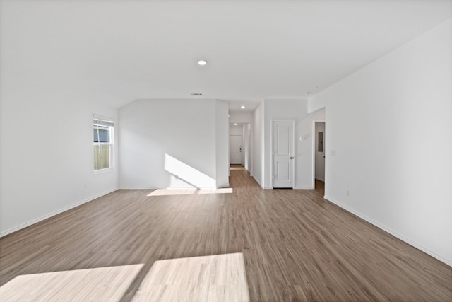 unfurnished living room featuring wood-type flooring