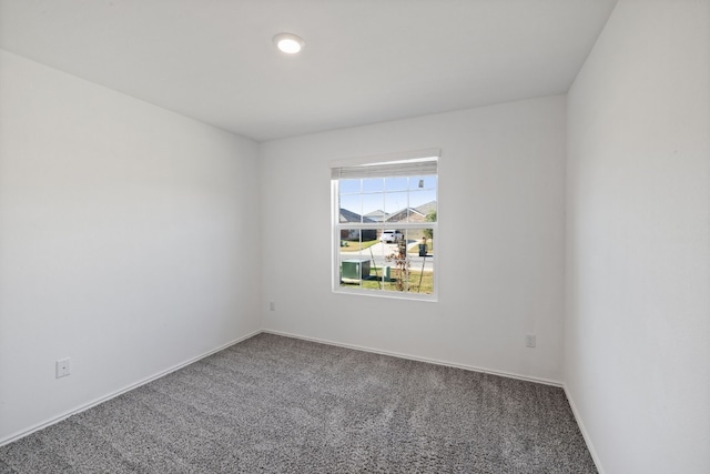 empty room featuring carpet flooring