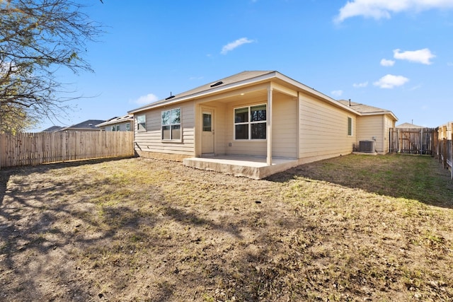 back of house featuring a patio and central AC unit