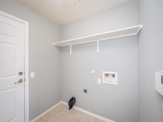 laundry room with electric dryer hookup, hookup for a gas dryer, hookup for a washing machine, and light tile patterned floors