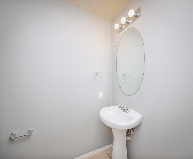 bathroom with tile patterned flooring