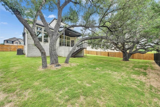 2204 Bayridge Rd, Georgetown, TX 78628 - view of yard featuring central air condition unit and stairs