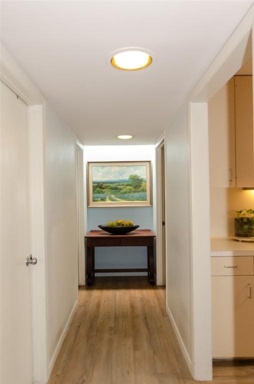 hallway featuring light hardwood / wood-style flooring