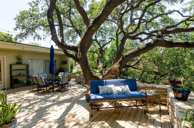 deck with an outdoor living space