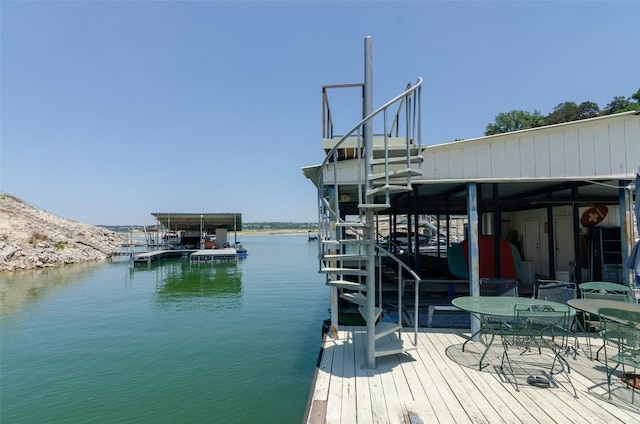 dock area with a water view