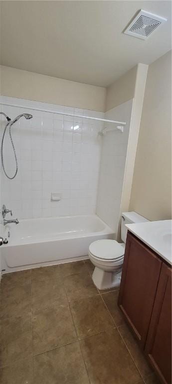 full bathroom with vanity, toilet, and tiled shower / bath combo