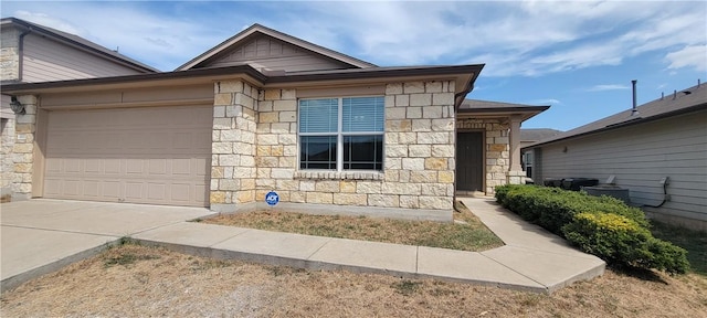 ranch-style home with a garage