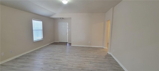 empty room with light hardwood / wood-style floors