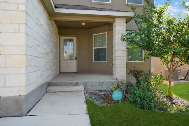 property entrance featuring central AC