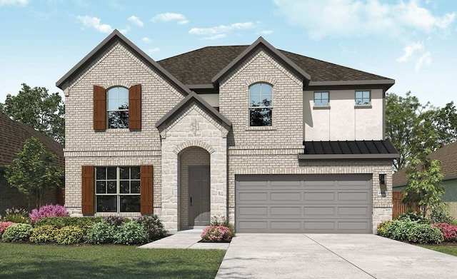 french country home featuring stone siding, a standing seam roof, brick siding, and a garage