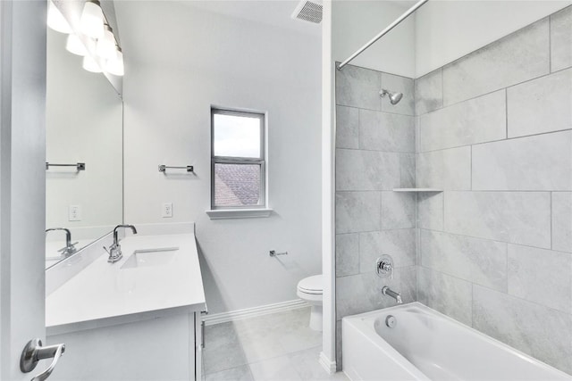 bathroom featuring baseboards, visible vents, toilet, tub / shower combination, and vanity