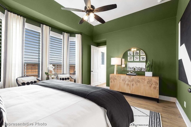 bedroom featuring ceiling fan and light wood-type flooring